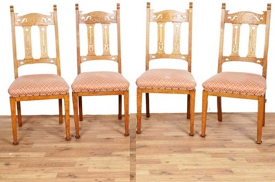 Lot 119 - A set of four early 20th Century oak Arts and Crafts chairs