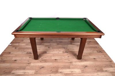 Lot 78 - A mahogany pool dining table