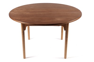 Lot 754 - Westnofa: a Norwegian circular teak extending dining table