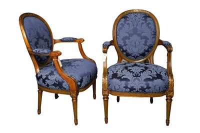 Lot 694 - A pair of Edwardian parcel gilt walnut armchairs from the R.M.S. ‘Berengaria’