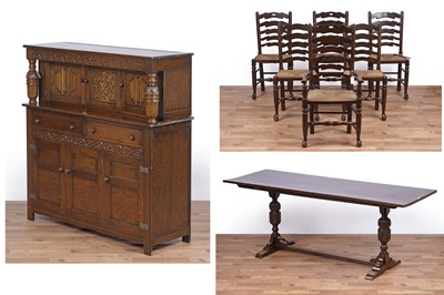 Lot 6 - A Jacobean style eight piece oak dining room suite