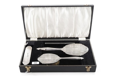 Lot 350 - A silver mounted dressing table set