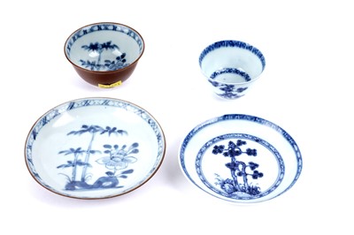 Lot 322 - Two Nanking Cargo tea bowls and saucers