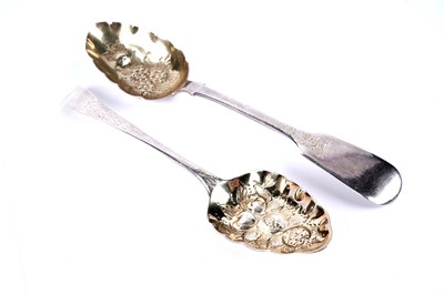 Lot 406 - Two Georgian silver berry spoons