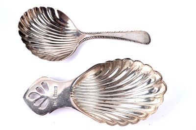 Lot 400 - A silver Eagle's Wing pattern caddy spoon; and two others