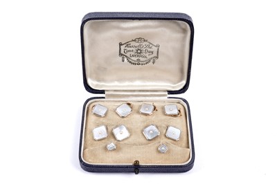 Lot 279 - A set of Art Deco mother-of-pearl and seed pearl dress studs