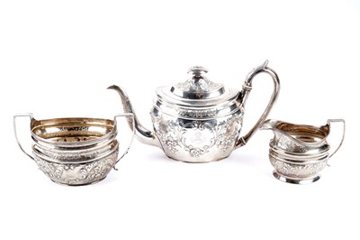 Lot 429 - A Georgian silver three-piece tea service