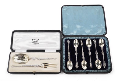 Lot 437 - An Edwardian silver spoon and fork; and a set of apostle spoons