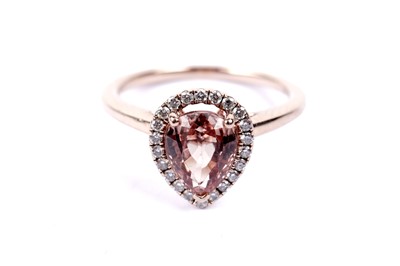 Lot 662 - A garnet and diamond cluster ring