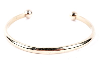 Lot 55A - A 9ct yellow gold torc bangle