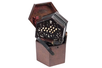 Lot 4 - An un-marked 27 button concertina with fitted mahogany case