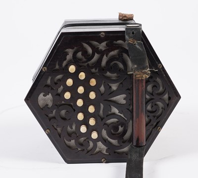 Lot 4 - An un-marked 27 button concertina with fitted mahogany case