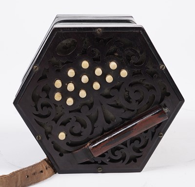Lot 4 - An un-marked 27 button concertina with fitted mahogany case