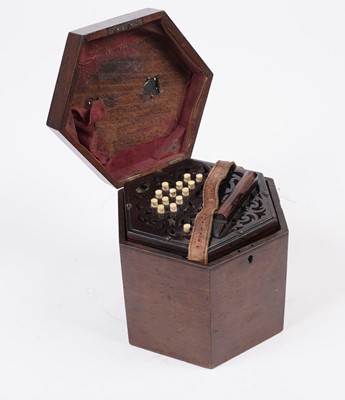 Lot 4 - An un-marked 27 button concertina with fitted mahogany case