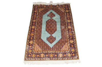 Lot 1180 - A silk Senneh rug