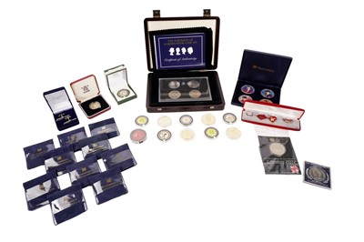 Lot 509 - A collection of commemorative coins sets