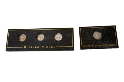 Lot 509 - A collection of commemorative coins sets