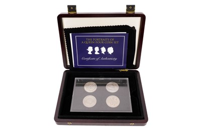 Lot 509 - A collection of commemorative coins sets
