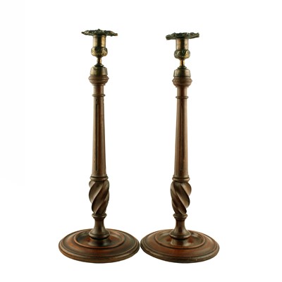 Lot 400 - A pair of Georgian style mahogany candlesticks