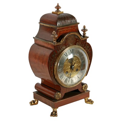 Lot 282 - An early 20th Century brass inlaid mahogany mantel clock