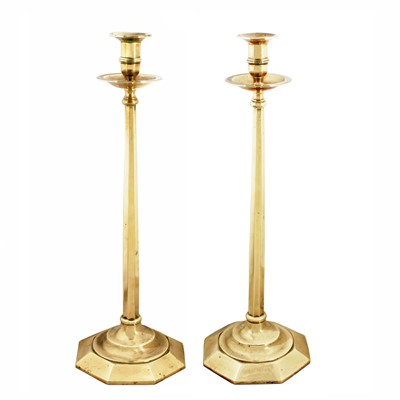 Lot 402 - A large pair of late Victorian brass candlesticks