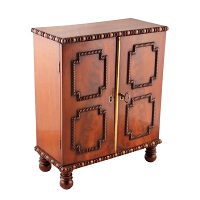 Lot 449 - A Regency mahogany two-door table cabinet