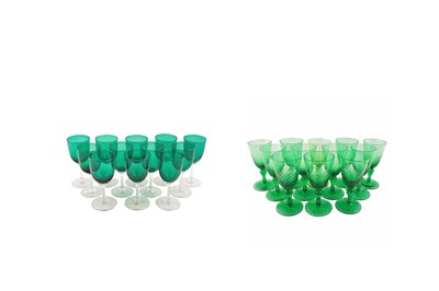 Lot 104 - Two sets of twelve Edwardian green wine glasses