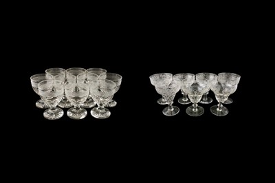 Lot 111 - A set of eleven mid-20th Century cut wine glasses; and seven others