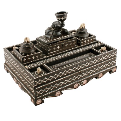 Lot 399 - A decorative early 20th Century Anglo Indian carved ebony and bone inlaid standish