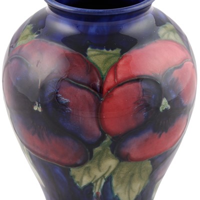 Lot 38 - A Walter Moorcroft 'Pansy' pattern vase