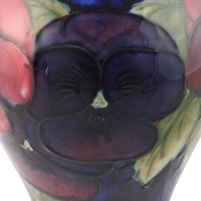 Lot 38 - A Walter Moorcroft 'Pansy' pattern vase