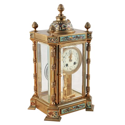 Lot 283 - A late 19th Century French gilt brass and champleve four glass mantel clock