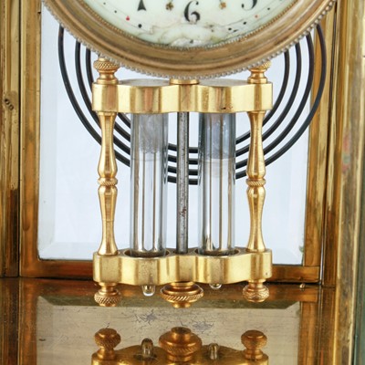 Lot 283 - A late 19th Century French gilt brass and champleve four glass mantel clock