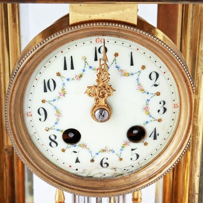 Lot 283 - A late 19th Century French gilt brass and champleve four glass mantel clock