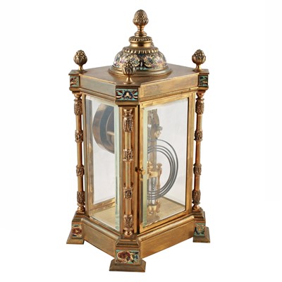 Lot 283 - A late 19th Century French gilt brass and champleve four glass mantel clock