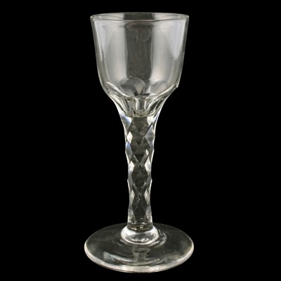 Lot 70 - Two George III wine glasses with facetted stems