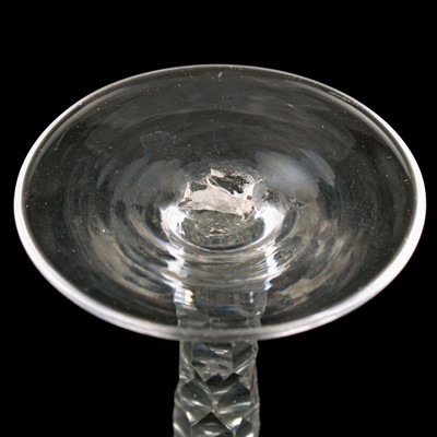 Lot 70 - Two George III wine glasses with facetted stems