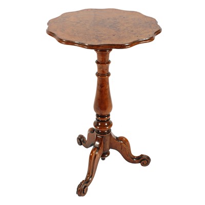 Lot 458 - A Victorian figured oak tripod table