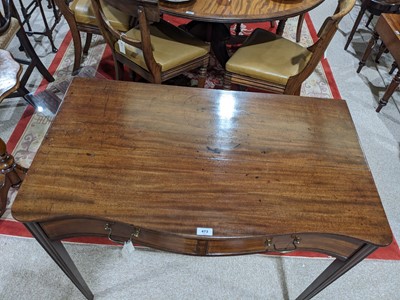 Lot 473 - A fine George III mahogany serpentine side table in the Hepplewhite style