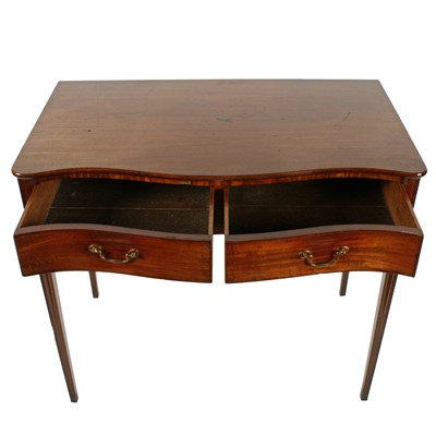 Lot 473 - A fine George III mahogany serpentine side table in the Hepplewhite style