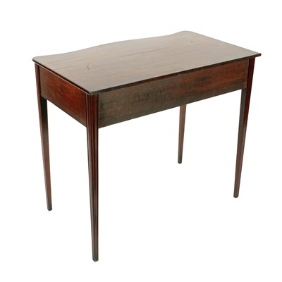 Lot 473 - A fine George III mahogany serpentine side table in the Hepplewhite style