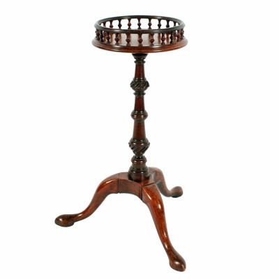 Lot 484 - A George II style walnut gallery top tripod kettle stand