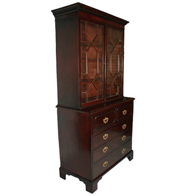 Lot 487 - A George III mahogany secretaire chest with a bookcase top