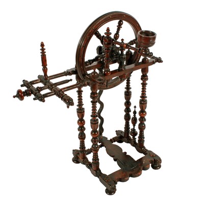 Lot 350 - A mid-18th Century Continental turned and carved wood spinning wheel