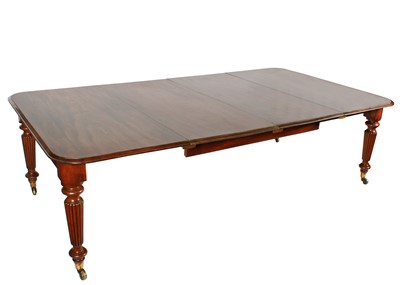 Lot 514 - A George IV mahogany extending dining table by J Kendall & Co of Leeds