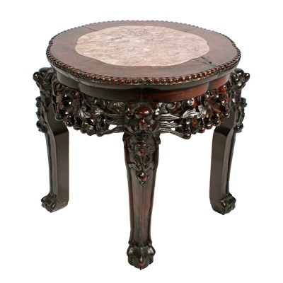 Lot 12 - A Chinese carved rosewood and marble top stand