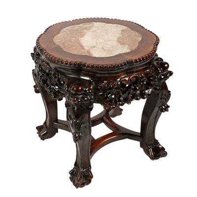 Lot 13 - A Chinese carved rosewood and marble top stand