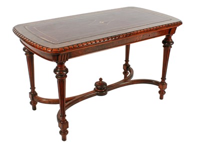 Lot 536 - A Victorian figured and burr walnut library table by John Taylor & Son