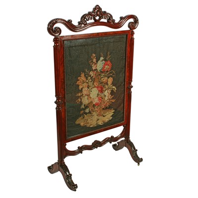 Lot 357 - A William IV mahogany and needlework fire screen