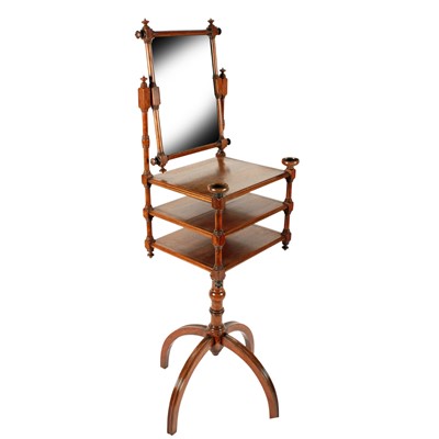 Lot 556 - A Victorian walnut aesthetic design dressing or shaving stand